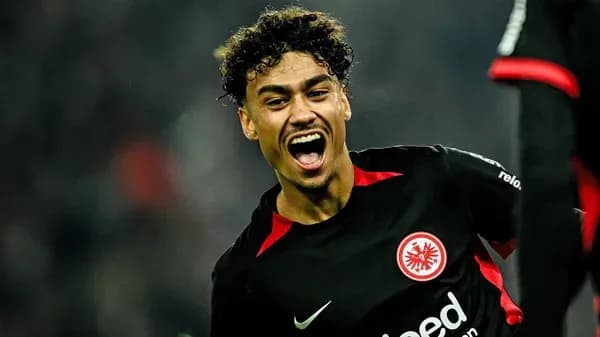 Player celebrating a goal in Eintracht Frankfurt jersey