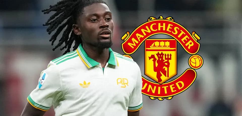 Player in white jersey with Manchester United logo