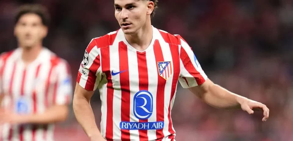 Atletico Madrid player in red and white kit