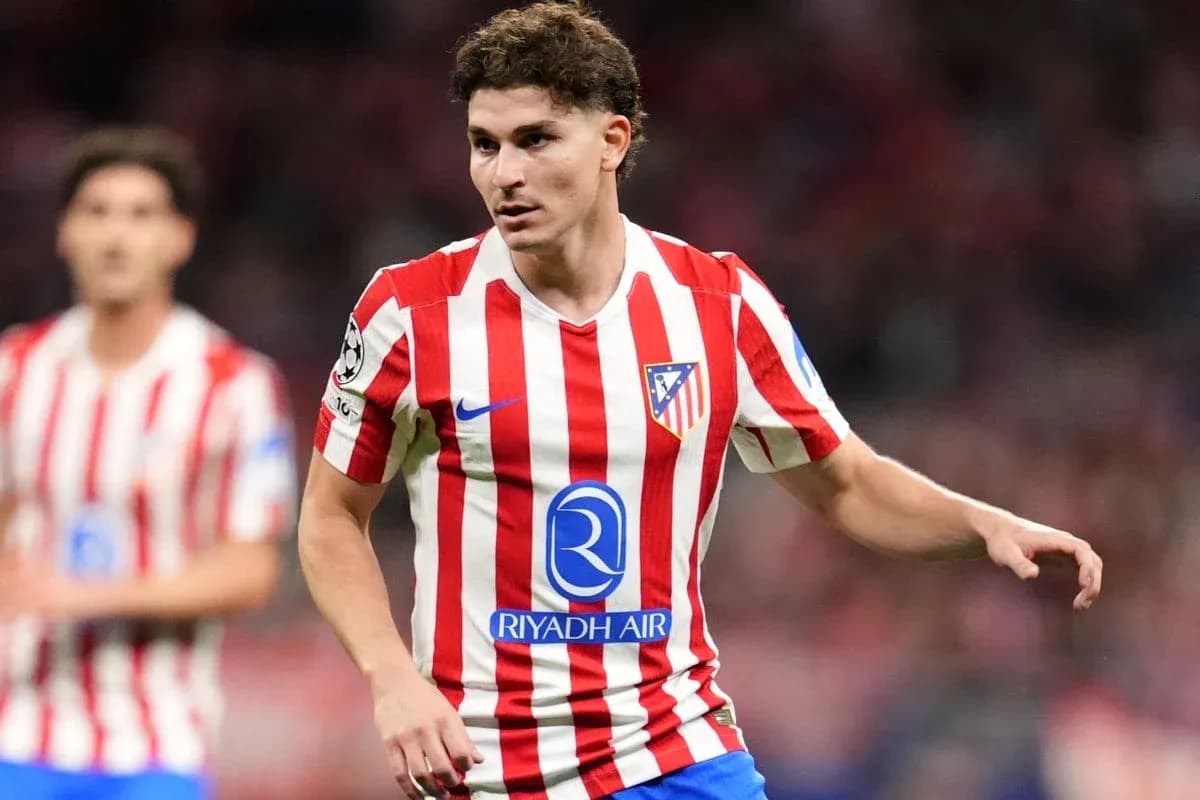 Atletico Madrid player in red and white kit