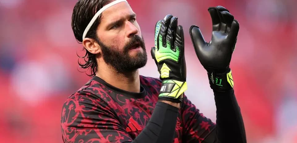 Goalkeeper preparing for the match in warm-up gear