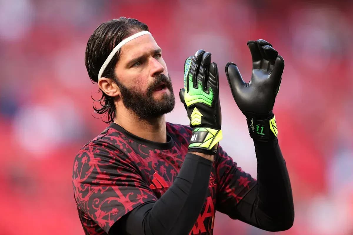 Goalkeeper preparing for the match in warm-up gear