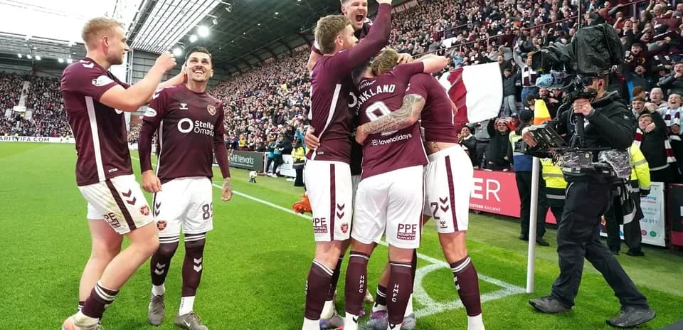 Hearts players celebrating a goal during match