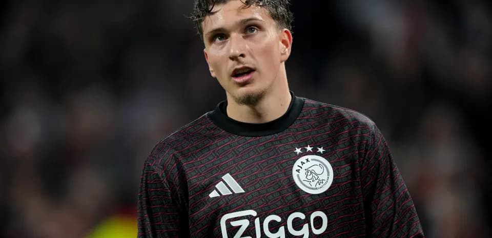 Goalkeeper in Ajax jersey during a match