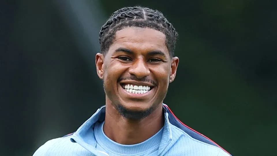 Player smiling during training session outdoors
