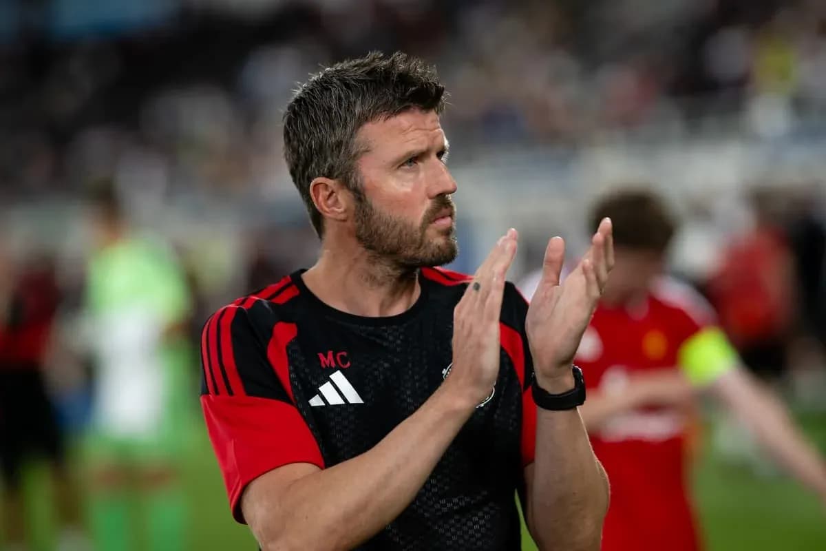 Coach applauding players after a match