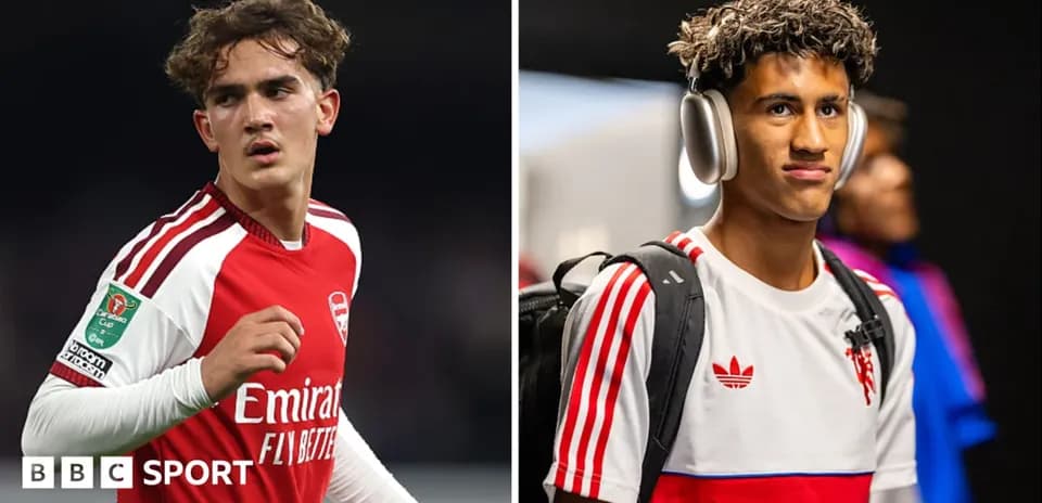 Two young football players in Arsenal jerseys