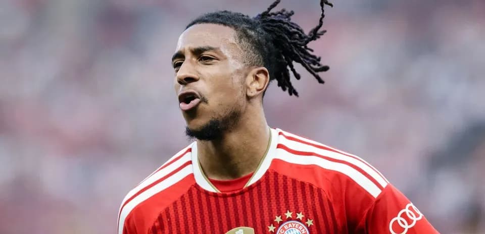 Player celebrating in Bayern Munich jersey during match