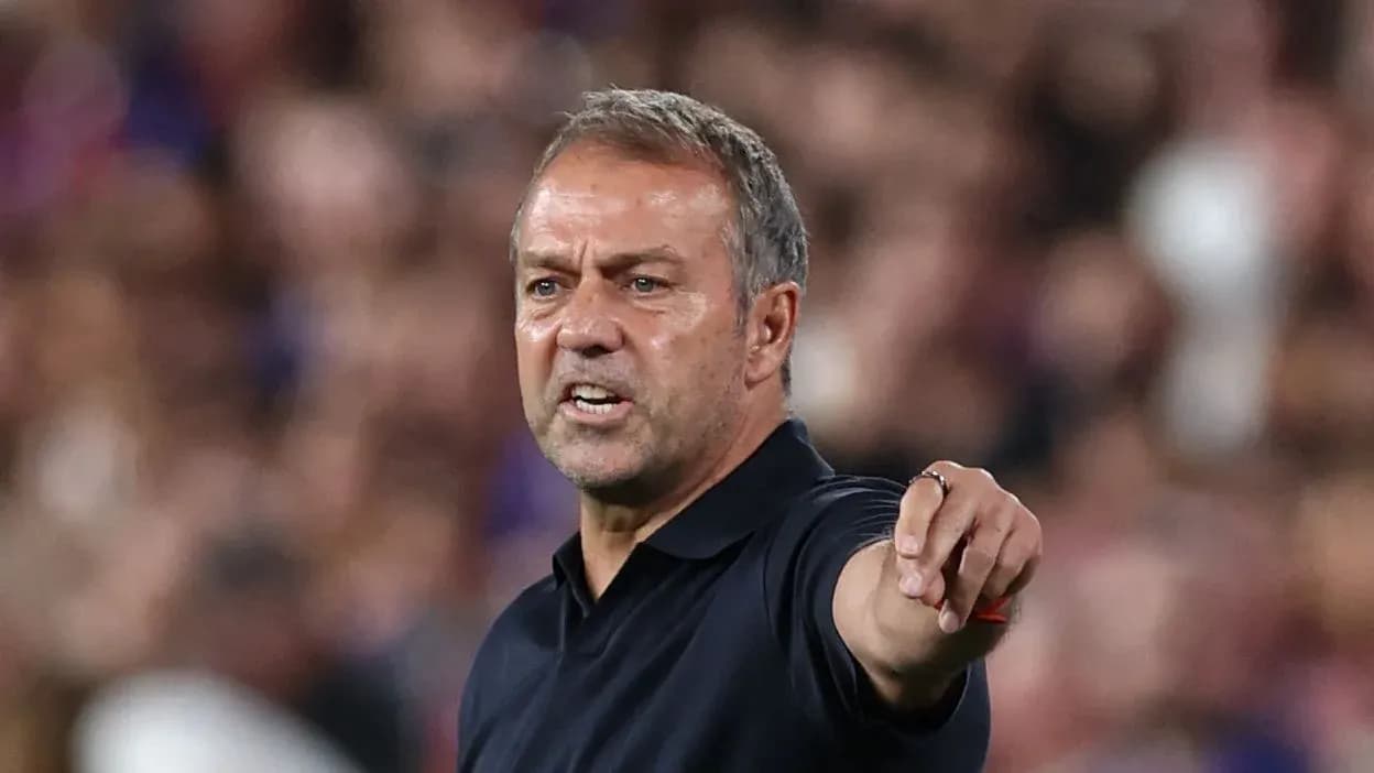 Coach gesturing during a match on the sidelines