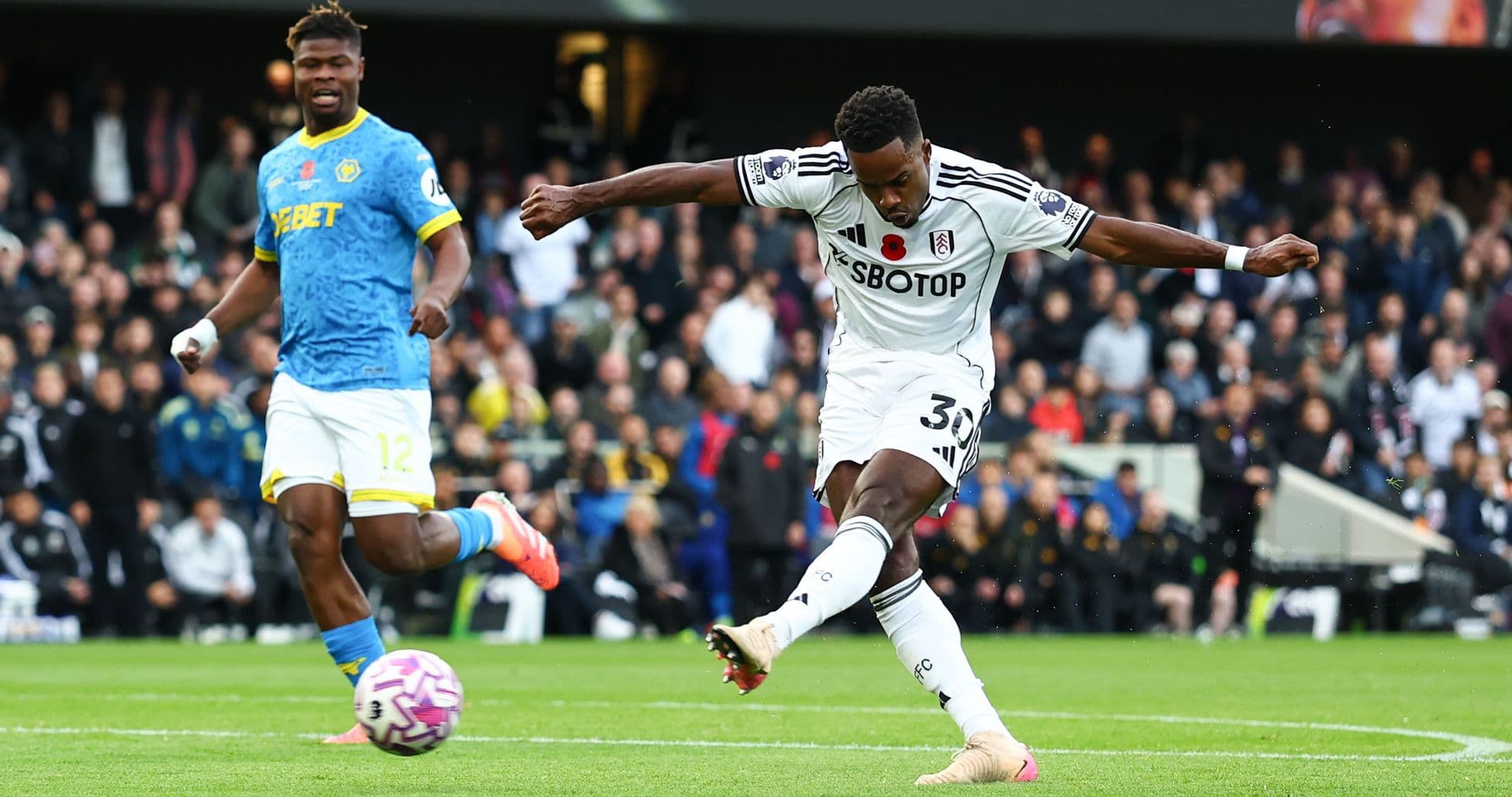Fulham player shooting during Wolves match