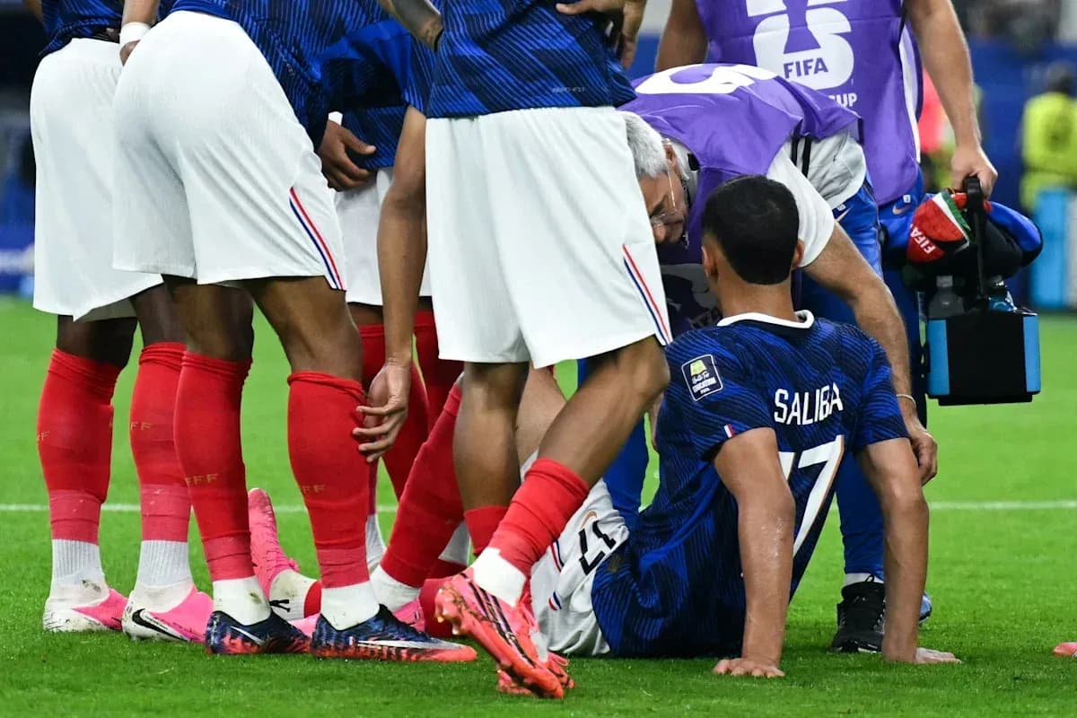 Player receiving medical attention on the field