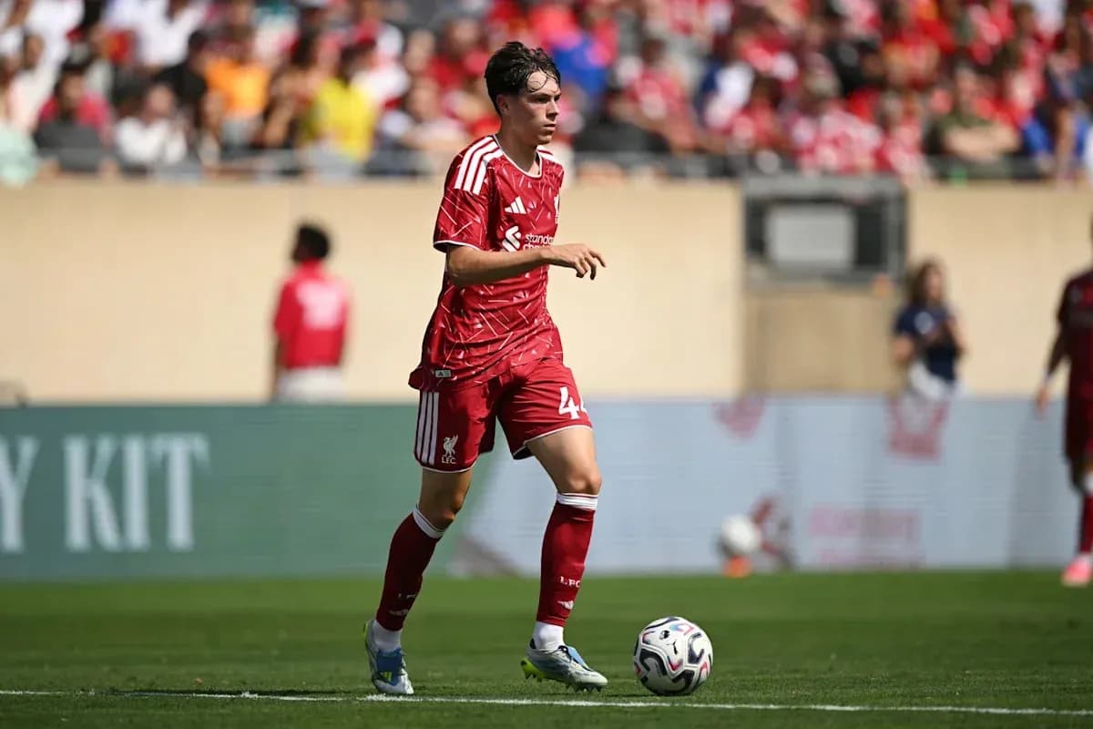 Player in red Liverpool kit during match action