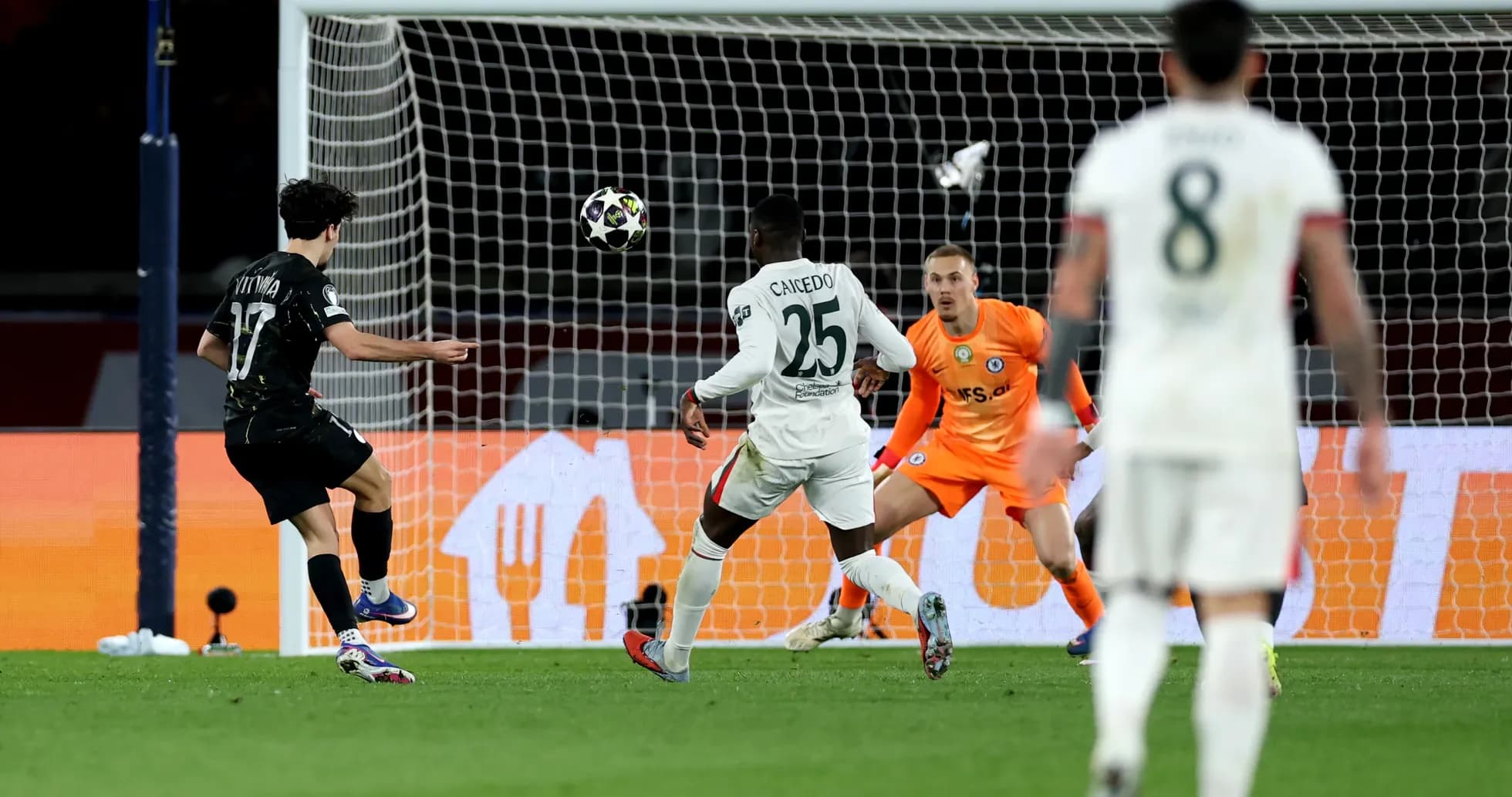 Player shoots at goal during Chelsea vs PSG match