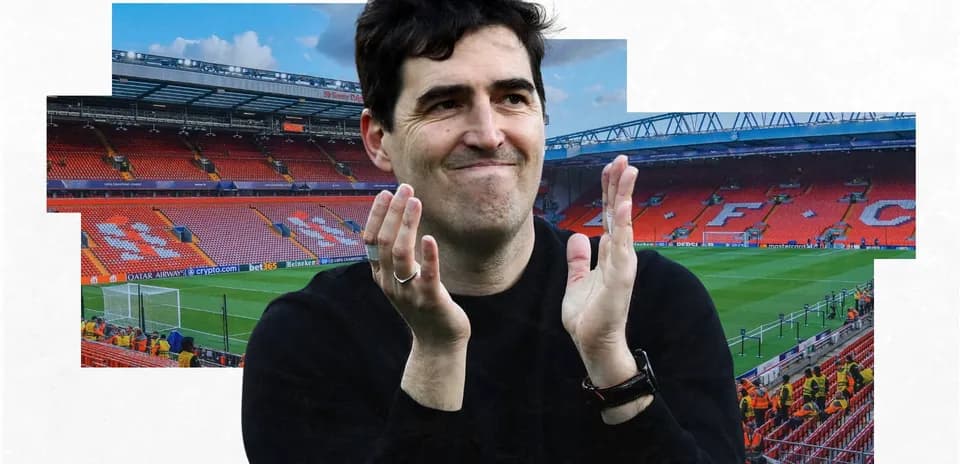 Man clapping in empty stadium with red seats