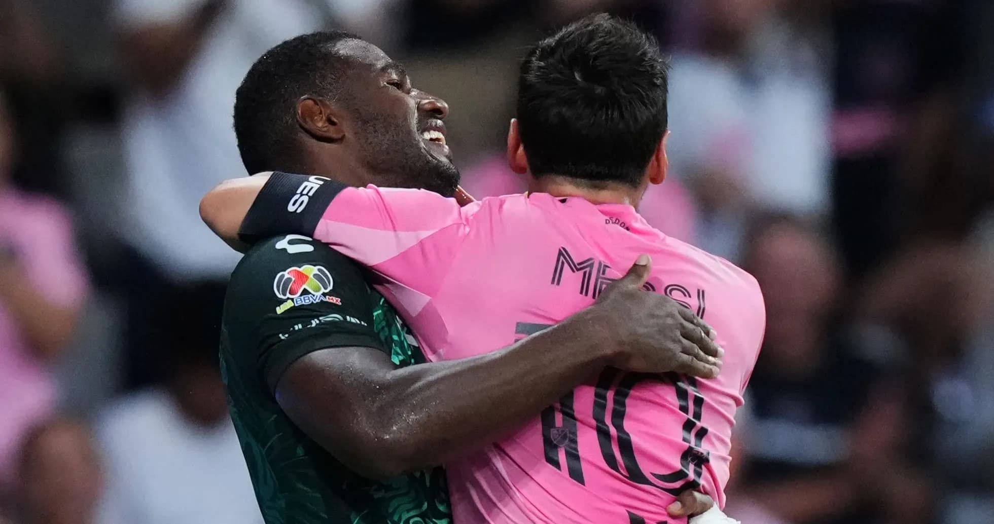 Players embracing after a match celebration