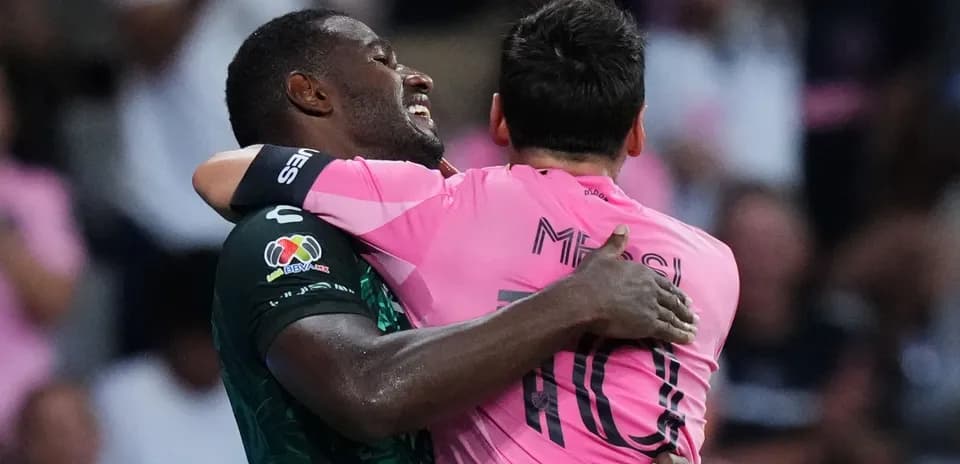 Players embracing after a match celebration