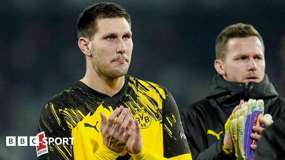 Goalkeeper applauding fans after a match