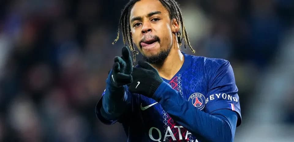 Player celebrating while wearing PSG jersey