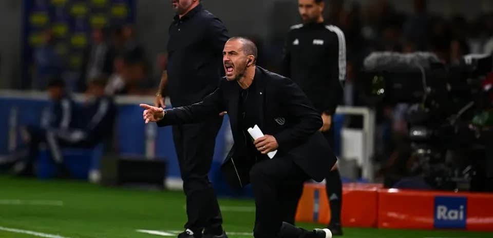 Coaches giving instructions from the sidelines during match