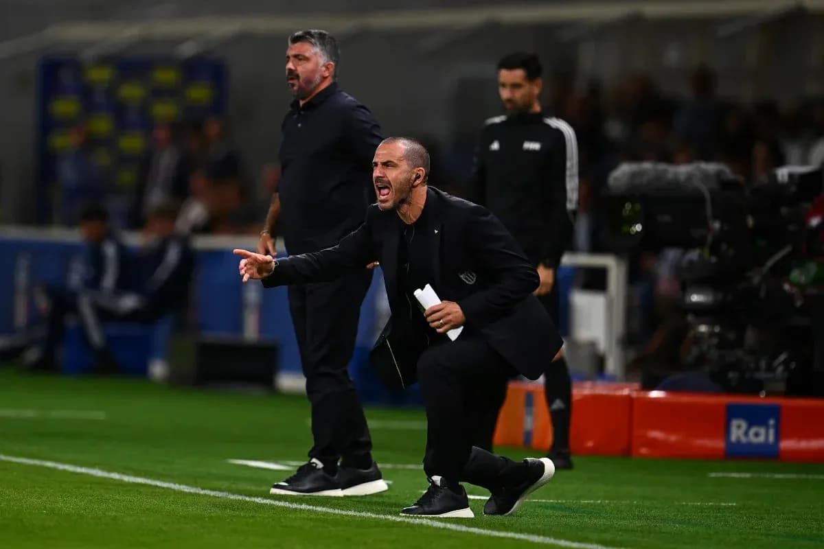 Coaches giving instructions from the sidelines during match
