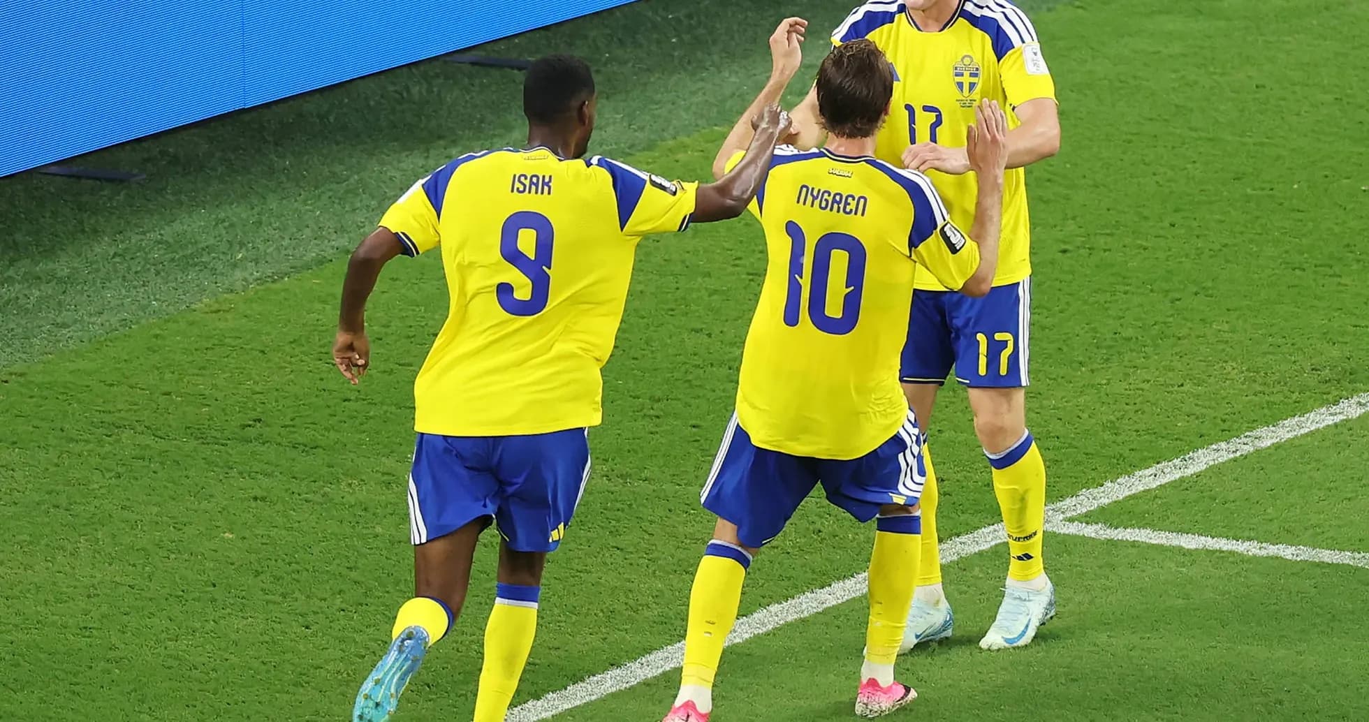 Swedish players celebrating a goal during match