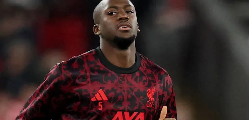 Player warming up in Liverpool FC training kit