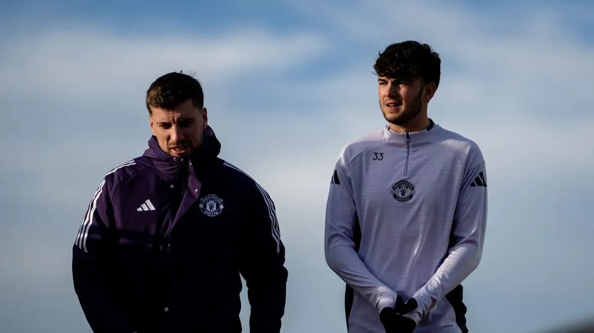 Two Manchester United players walking during training