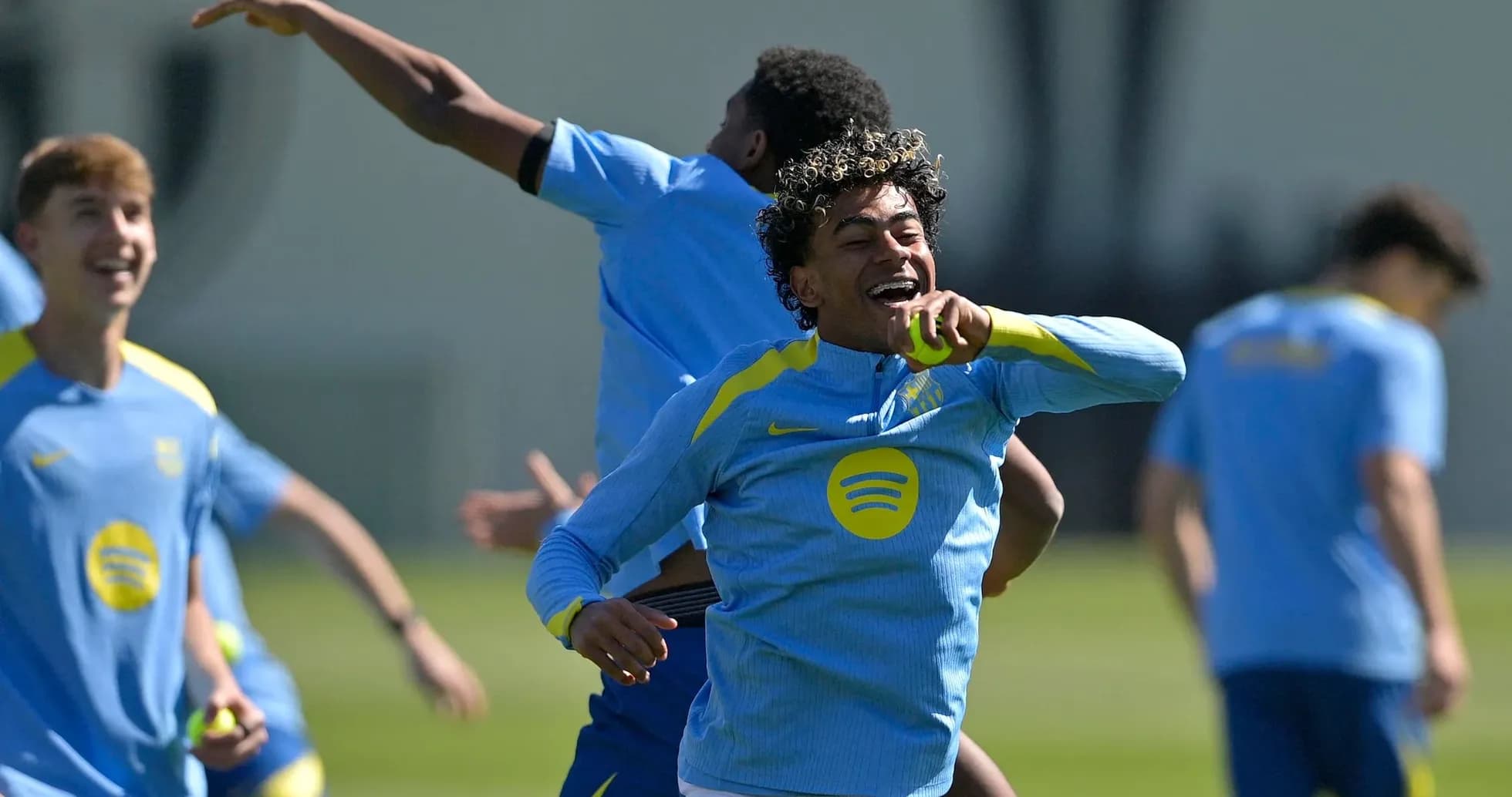 Players celebrating during a training session