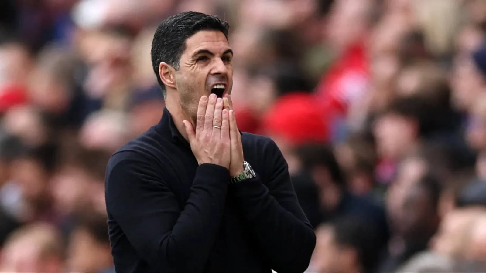 Manager reacting during a match on the sidelines