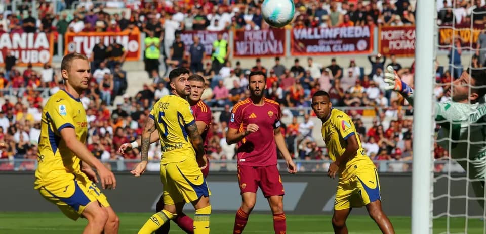 Players watching the ball during Hellas Verona match