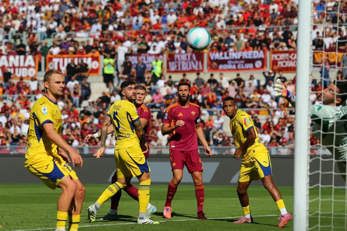 Players watching the ball during Hellas Verona match
