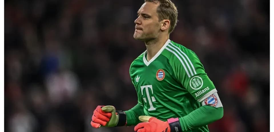 Goalkeeper in green kit running on the field