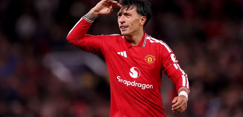 Player celebrating in Manchester United jersey on field