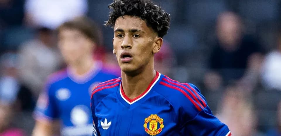 Manchester United player in blue kit on field