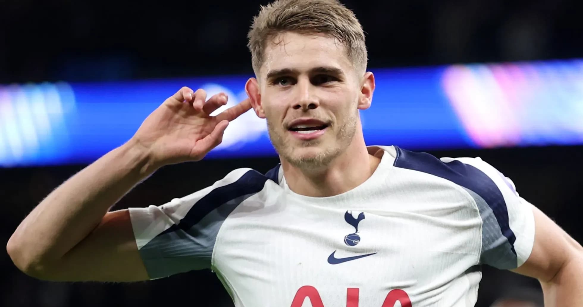 Player celebrating and gesturing to crowd