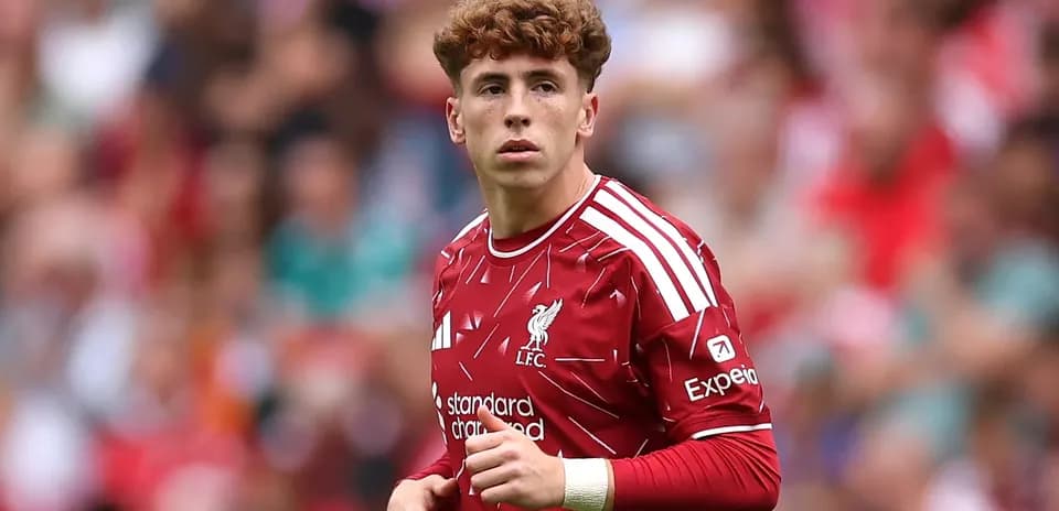 Liverpool player in red kit on the field