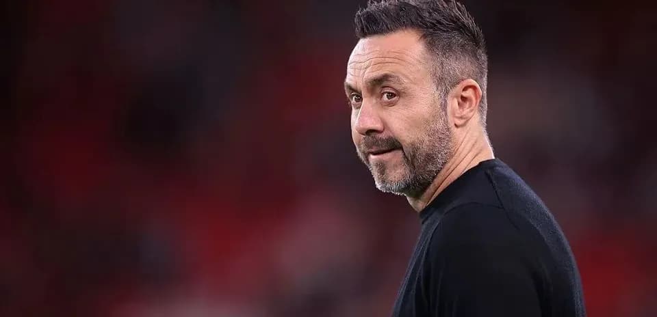 Manager looking towards the field during match