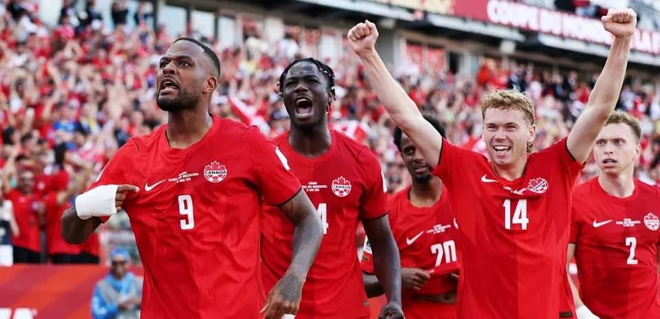 Canada players celebrating during World Cup match