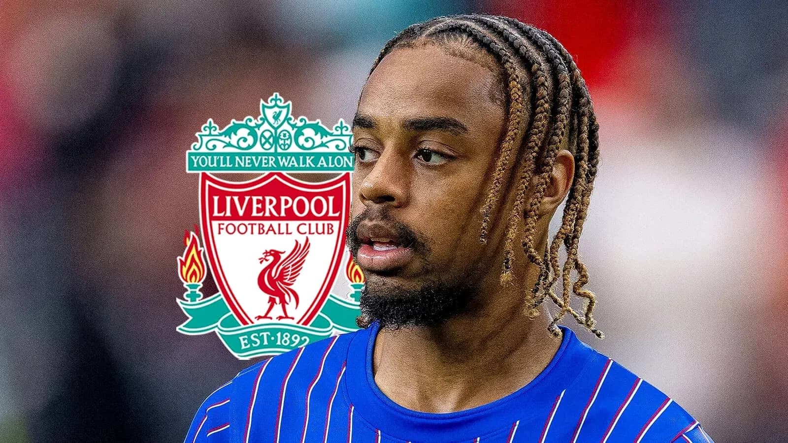 Player in blue jersey with Liverpool logo in background