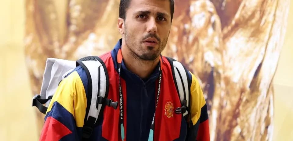 Athlete wearing national team jacket and backpack