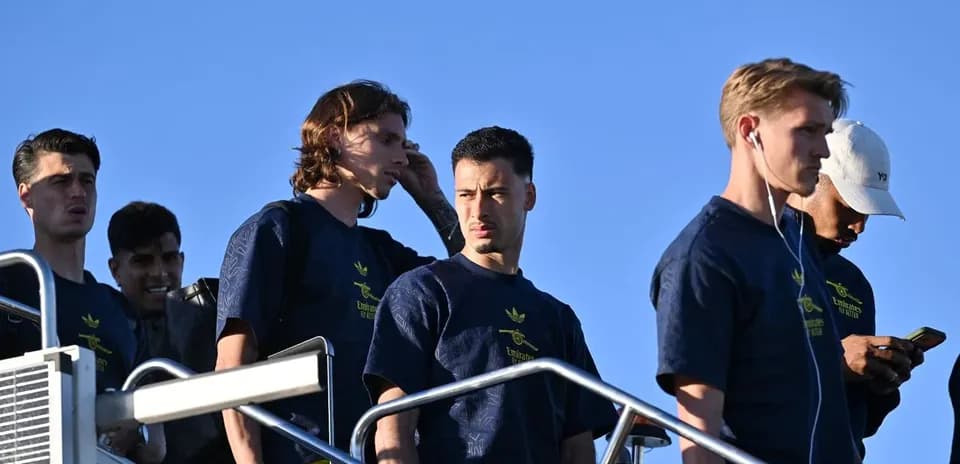 Players arriving at training facility in team attire