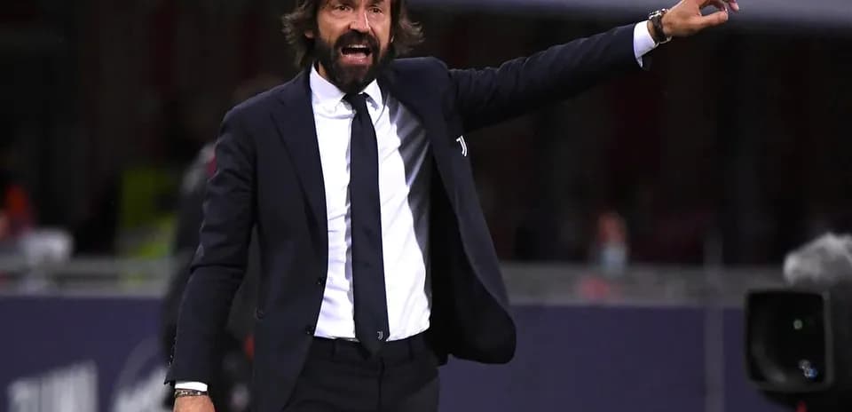 Coach gesturing during match on the sidelines