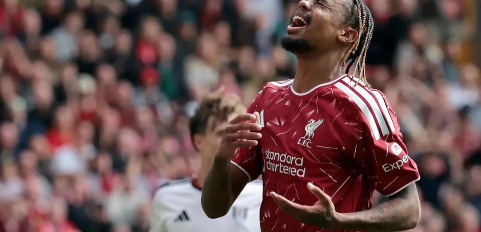 Liverpool player expressing frustration during match