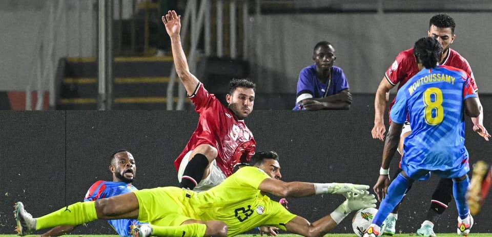 Players contesting for the ball during a match