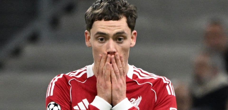 Player in Liverpool kit covering face with hands