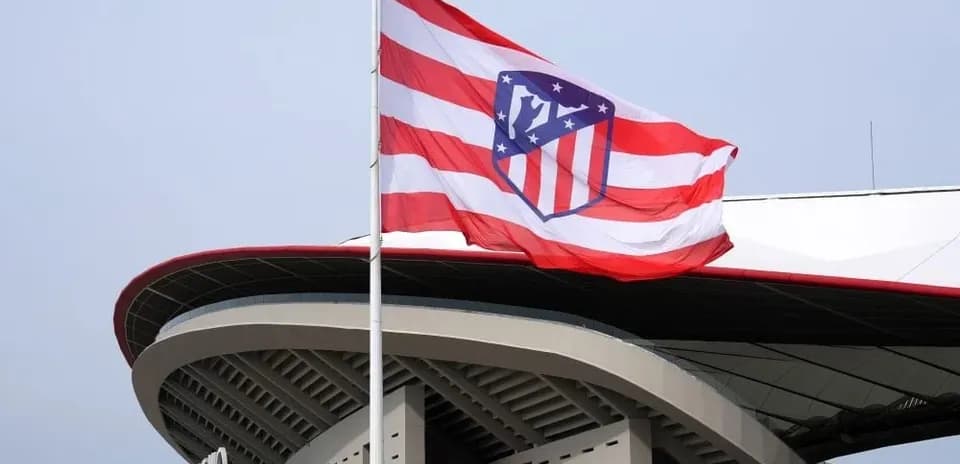 Atletico Madrid flag waving outside stadium