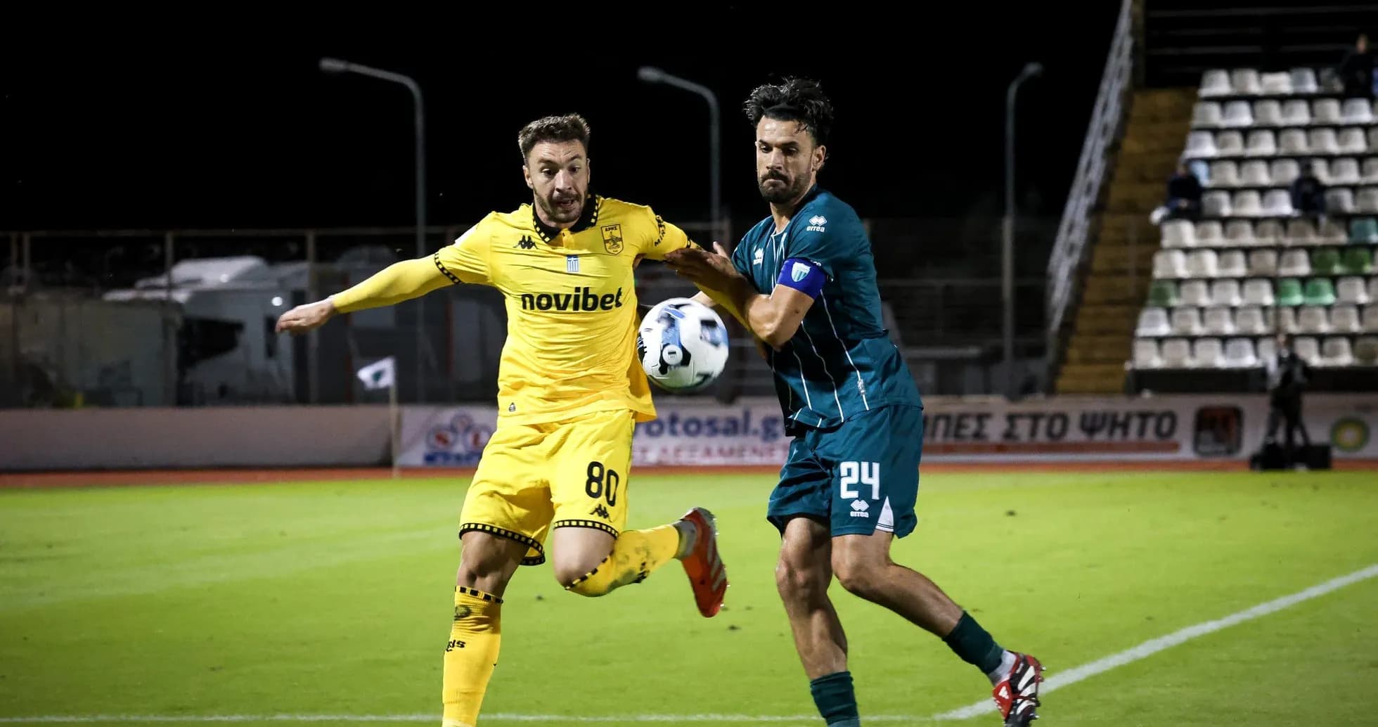 Players contesting for the ball during match