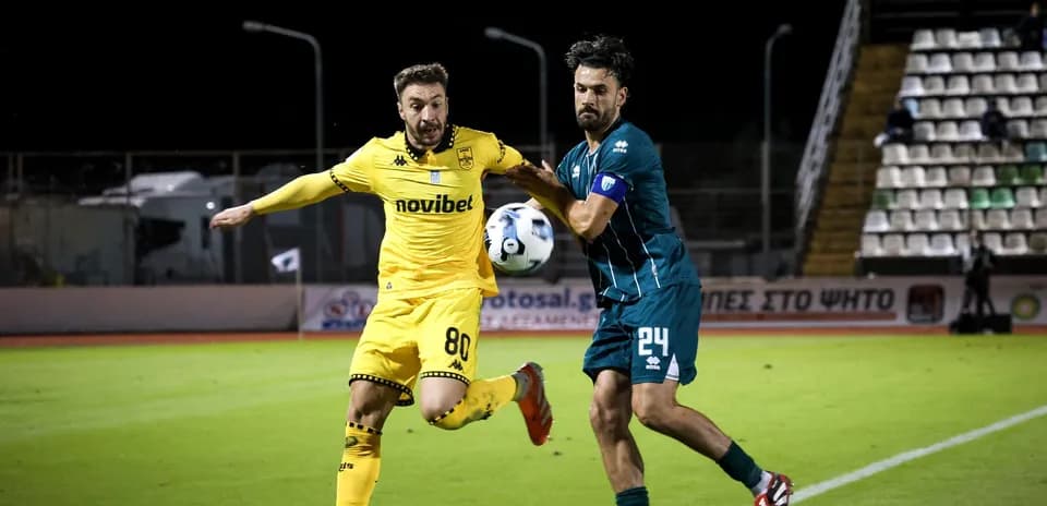 Players contesting for the ball during match