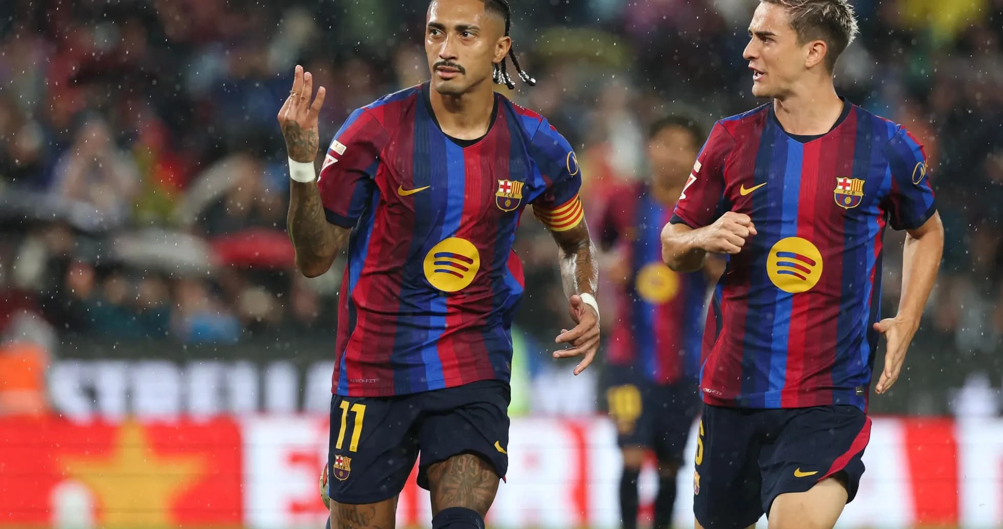 Barcelona players celebrating a goal during match