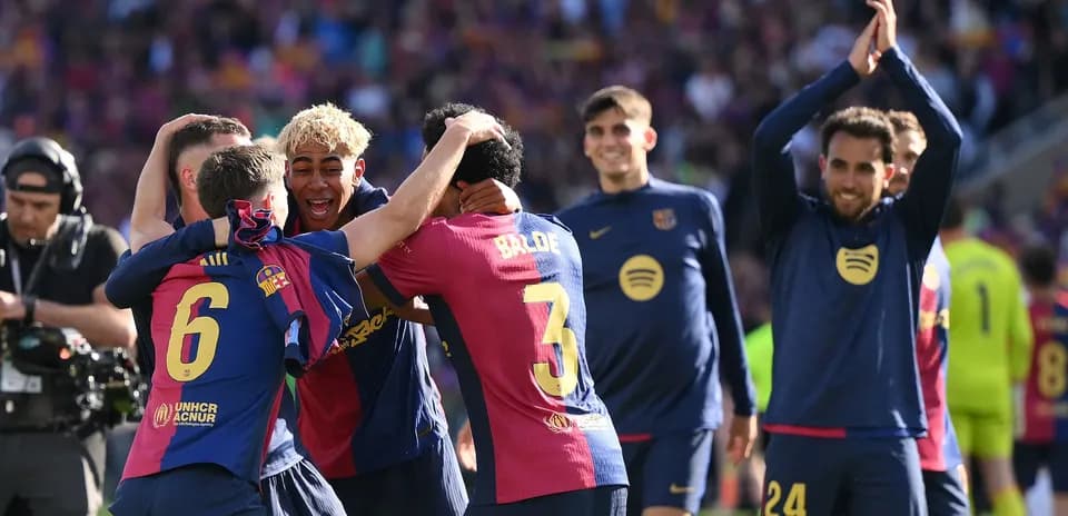 Barcelona players celebrating after a match victory